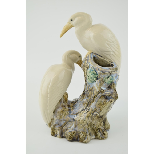 94 - Continental Majolica spill vase with white Egrets. Late 20th century. Height 26.5cm.