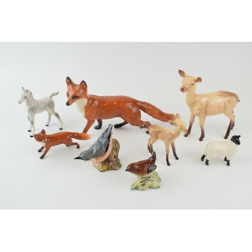 2 - A collection of Beswick animals a/f to include Fox, Deer, Sheep, Horse and Bird. (7)