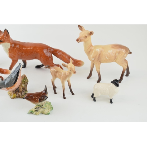 2 - A collection of Beswick animals a/f to include Fox, Deer, Sheep, Horse and Bird. (7)