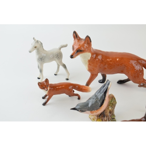 2 - A collection of Beswick animals a/f to include Fox, Deer, Sheep, Horse and Bird. (7)