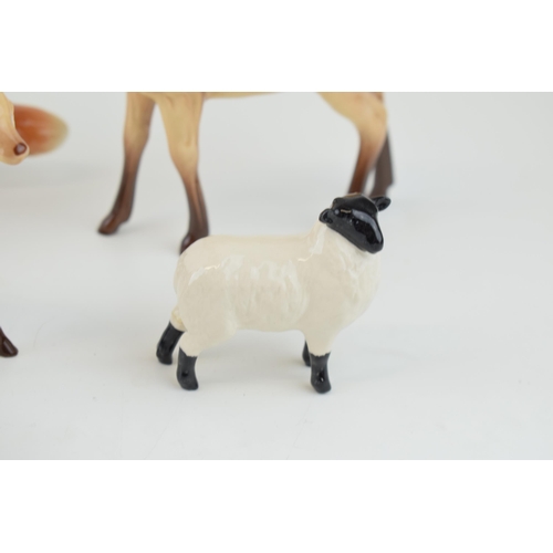 2 - A collection of Beswick animals a/f to include Fox, Deer, Sheep, Horse and Bird. (7)