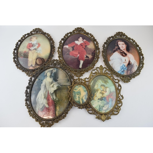 101 - A collection of mid century baroque style ornate metal frames with prints of Italian masters under c... 