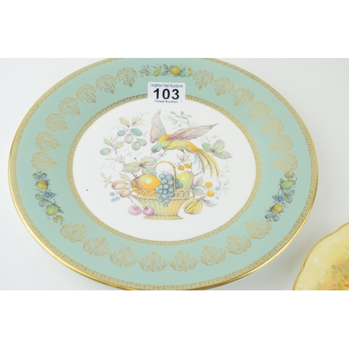 103 - An Aynsley Orchard Gold plate, 21cm diameter, with an Aynsley exotic bird amongst fruit and foliage,... 