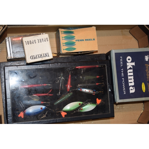 105 - A large mixed collection of fishing items to include lures, lines, weights and boxed reels. (Qty) 3 ... 