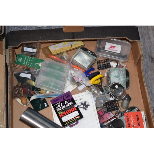 105 - A large mixed collection of fishing items to include lures, lines, weights and boxed reels. (Qty) 3 ... 