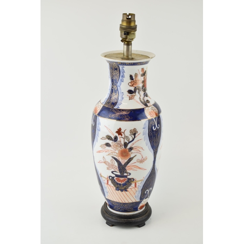 109 - Large 20th century oriental lamp base, with traditional Imari style scenes, 41cm tall.