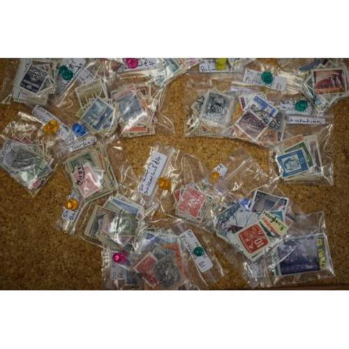 120 - A mixed collection of loose stamps to include mostly world stamps. (Qty)