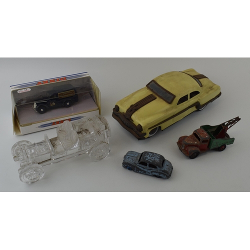 151 - A mixed collection of vintage toys to include 50s style plastic / celluloid car and vintage 'Dinky T... 