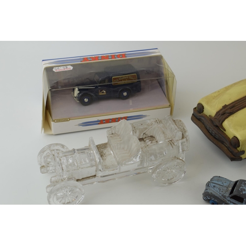 151 - A mixed collection of vintage toys to include 50s style plastic / celluloid car and vintage 'Dinky T... 