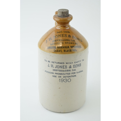 129 - Early to mid 20th century two tone stoneware flagon ' J H Jones & Sons Beverage Brewers', dated 1930... 