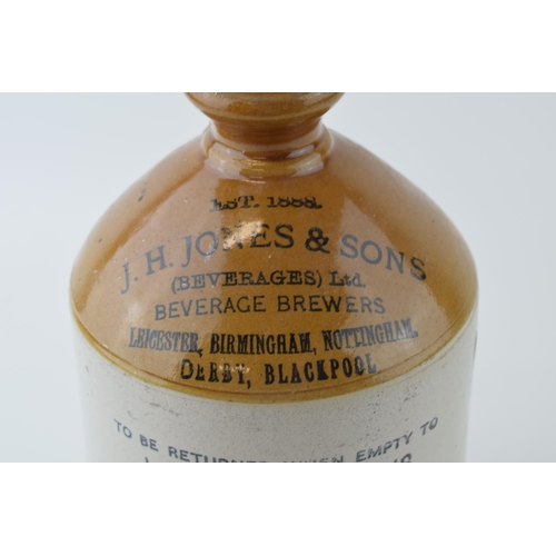 129 - Early to mid 20th century two tone stoneware flagon ' J H Jones & Sons Beverage Brewers', dated 1930... 