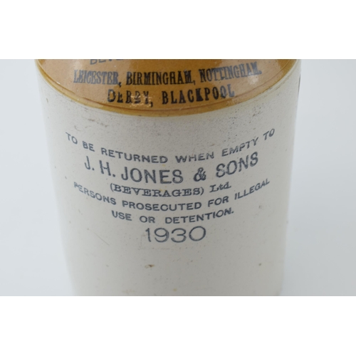 129 - Early to mid 20th century two tone stoneware flagon ' J H Jones & Sons Beverage Brewers', dated 1930... 