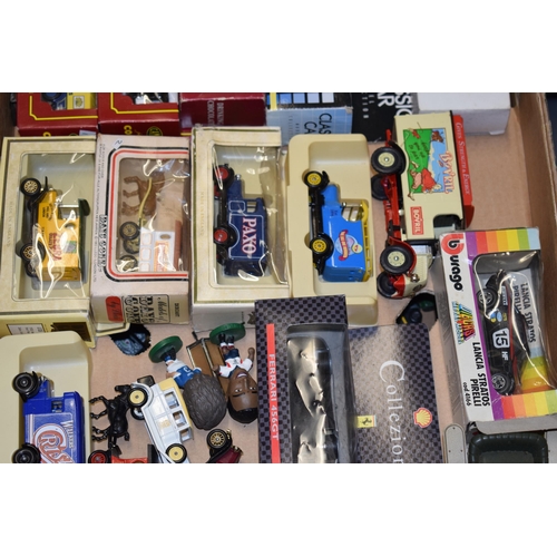 63 - A mixed collection of boxed vintage die cast vehicles to include Matchbox, Burago and similar manufa... 