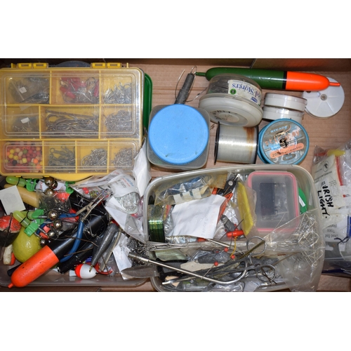 72 - A mixed collection of fishing items to include a large quantity of weights, floats, line and tools. ... 