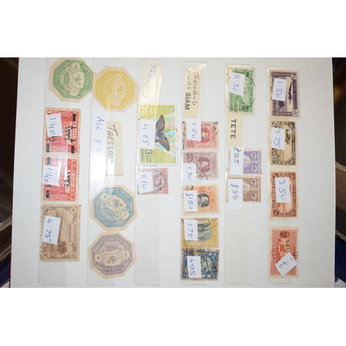 77 - A large quantity of vintage Uk and world stamps, multiple albums. (Qty)