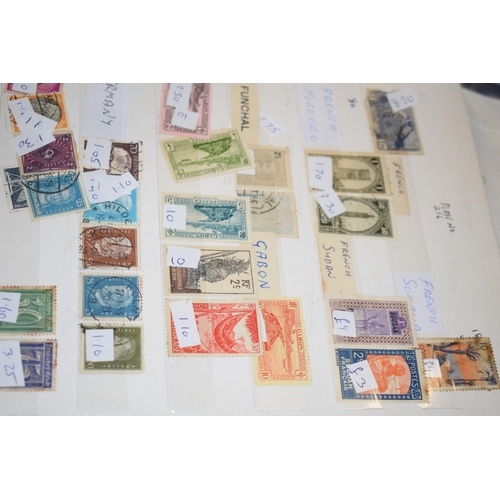 77 - A large quantity of vintage Uk and world stamps, multiple albums. (Qty)