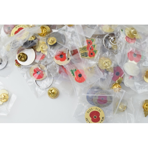 89 - A large collection of badges relating to The Royal British Legion, Help For Heroes and The Poppy App... 