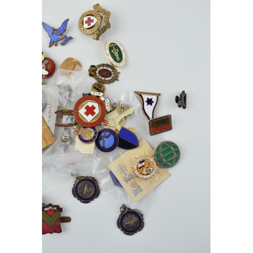 95 - A large collection of badges relating to The Royal British Legion, Help for Heroes and The Poppy App... 