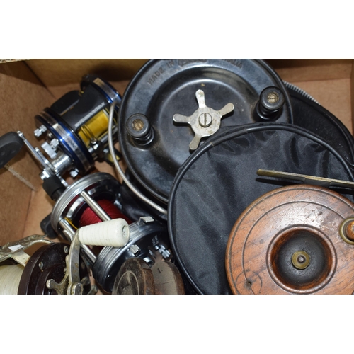 121 - A collection of fishing reels to include vintage and modern examples. (Qty)