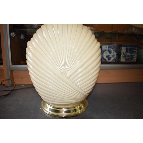 134 - A pair of mid to late 20th century Art Deco style glass lamp bases, ribbed design, with shades, 74cm... 