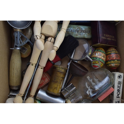 135 - A collection of vintage items to include ship in bottle, magnifying glass, tins, novelty items and o... 