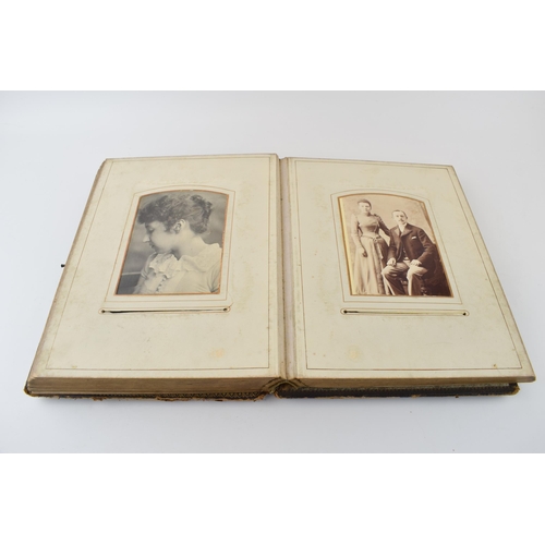 141 - A 19th century photograph album 'The Balmoral Album' to include family photographs, gentleman in mil... 