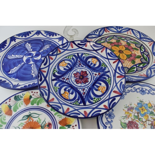 159 - A collection of ceramics to include Spanish pottery hand painted plates and cake stands together wit... 