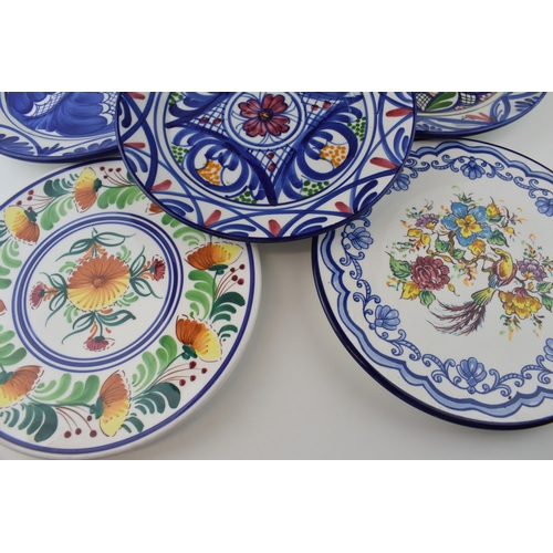 159 - A collection of ceramics to include Spanish pottery hand painted plates and cake stands together wit... 