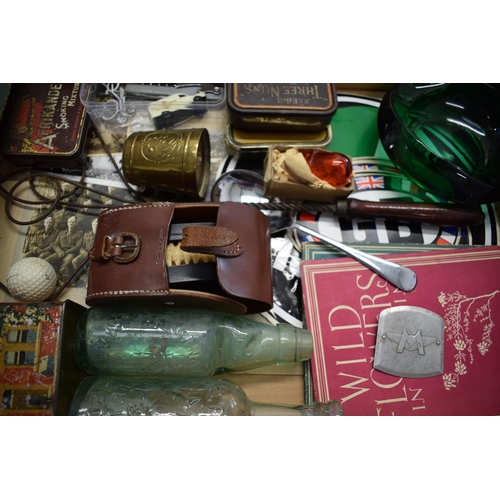 164 - A mixed collection of items to include vintage advertising tins, Puch and GB automobilia stickers, a... 