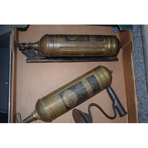 193 - Two vintage early c20th Pyrene fire extinguishers with three iron stands