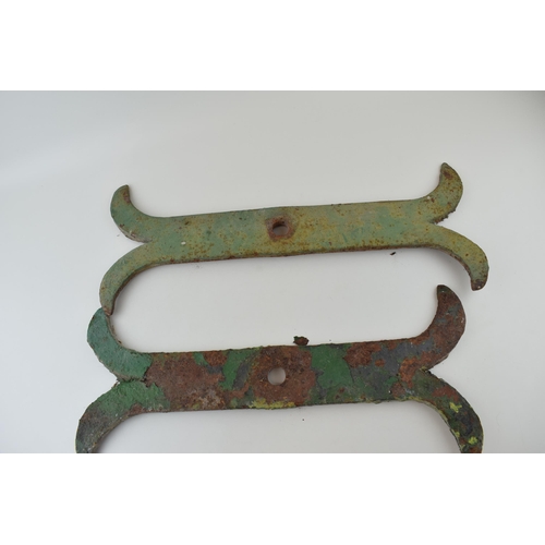 195 - A pair of antique Victorian cast iron architectural barn or wall ties