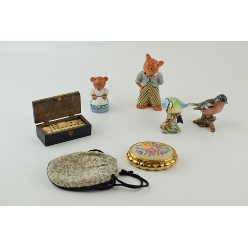 201 - A mixed collection of items to include two Beswick birds, a compact, two teddy bear figures and a bo... 