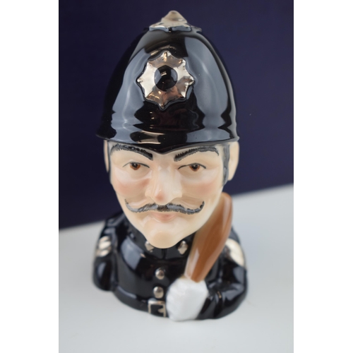 186 - Boxed Royal Worcester Policeman candle snuffer, limited edition, 113 of 600.