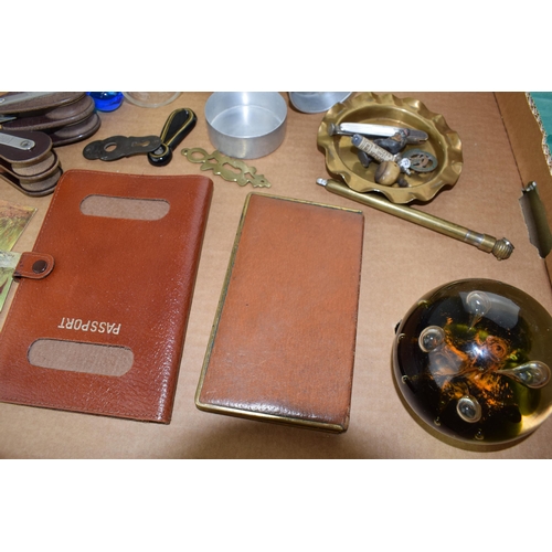 204 - A mixed collection of items to include vintage leather goods, collapsible cup, vintage postcards, ha... 