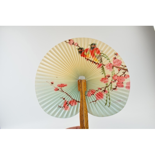 212 - A collection of mid 20th century and later decorative hand fans, varying sizes and styles, largest 5... 