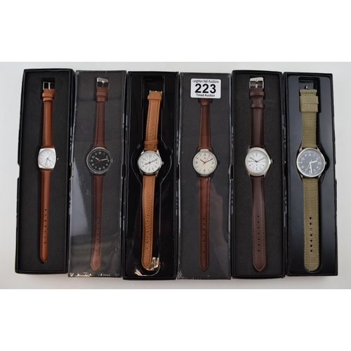 223 - A collection of new mens watches, boxed, as new.