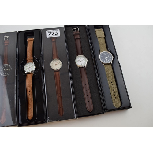 223 - A collection of new mens watches, boxed, as new.