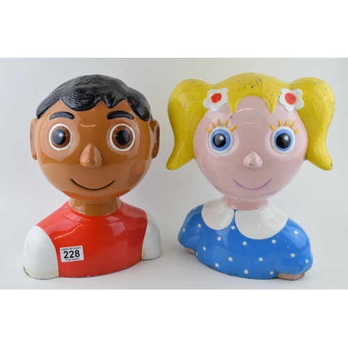 228 - A pair of fairground / children's ride heads made of composite material. Height 34cm, width 26cm. (2... 