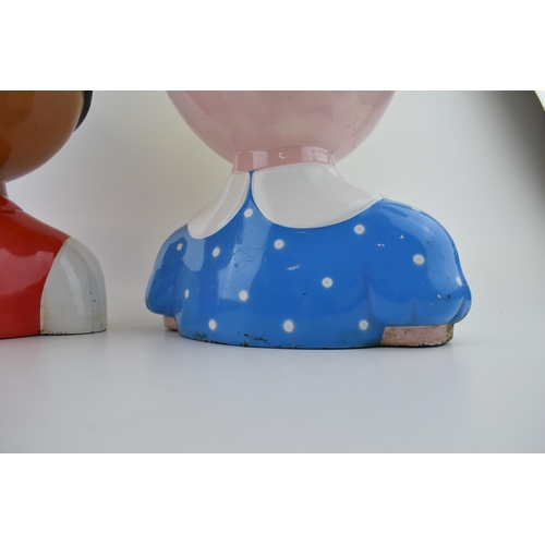 228 - A pair of fairground / children's ride heads made of composite material. Height 34cm, width 26cm. (2... 