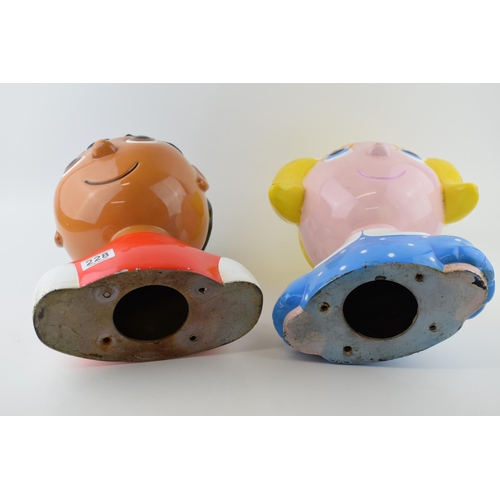 228 - A pair of fairground / children's ride heads made of composite material. Height 34cm, width 26cm. (2... 