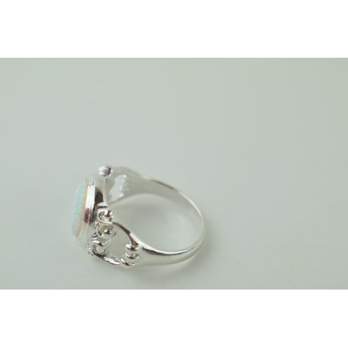 240 - Sterling silver contemporary ring, set opal style insert.