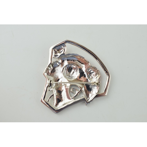 243 - Sterling silver contemporary Art Nouveau style brooch of a lady with red enamelled roses, 45mm wide.