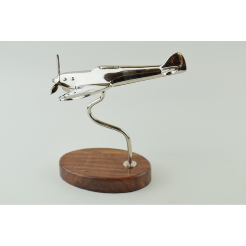 244 - Reproduction model of a WWII Spitfire plane, mounted on wooden base, engraved plaque with a Sir Wins... 