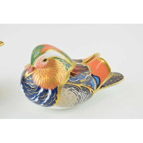 274 - Two Royal Crown Derby paperweights to include a Mallard and a Mandarin Duck, silver stoppers. Height... 