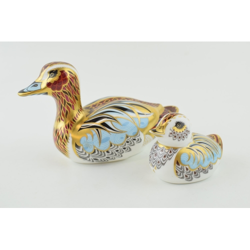 275 - Two Royal Crown Derby paperweights to include a Duck and a Collectors Guild Duckling. Height 10cm. (... 