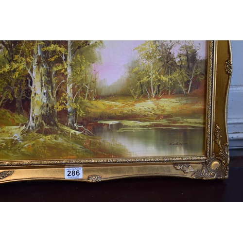 286 - F Holger, Oil on Canvas, Forrest scene with pond in gilt frame. 39cm x 49cm.