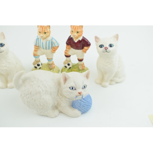 1 - A collection of Beswick items to include Beswick cats, two John Beswick 'Sporting Cats' and a Aynsle... 