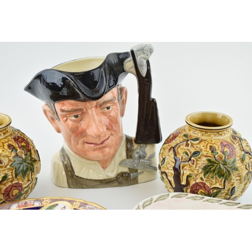 112 - A collection of ceramic items to include Royal Doulton, Character Jugs From Williamsburg 'Gunsmith' ... 