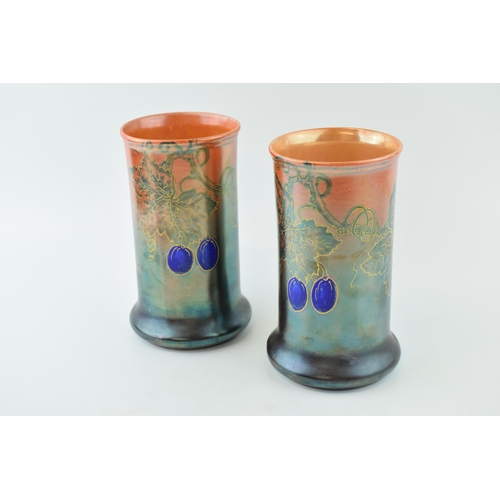 114 - A pair of Wilkinsons lustre vases, Art Deco, grape and vine decoration, orange mottled lustre, 20cm ... 