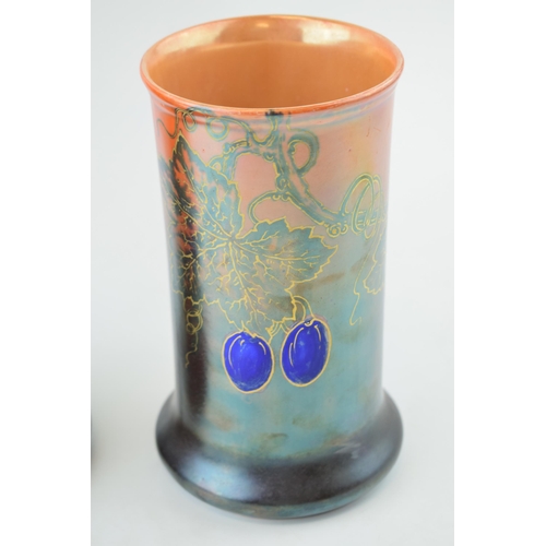 114 - A pair of Wilkinsons lustre vases, Art Deco, grape and vine decoration, orange mottled lustre, 20cm ... 